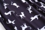 up close black cat pjs