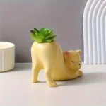 yellow tailless cat planter pot